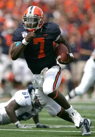 Isiah Williams scrambling for yardage as the Illinois quarterback