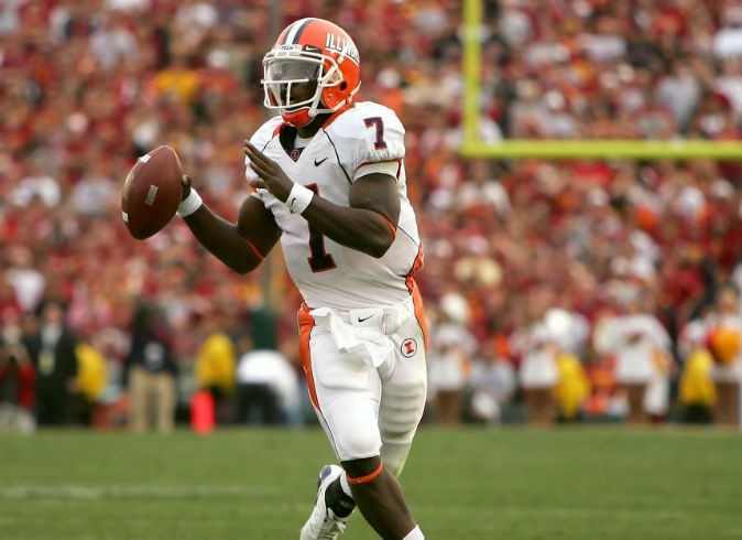 Isiah Williams throwing a pass as the Illinois quarterback